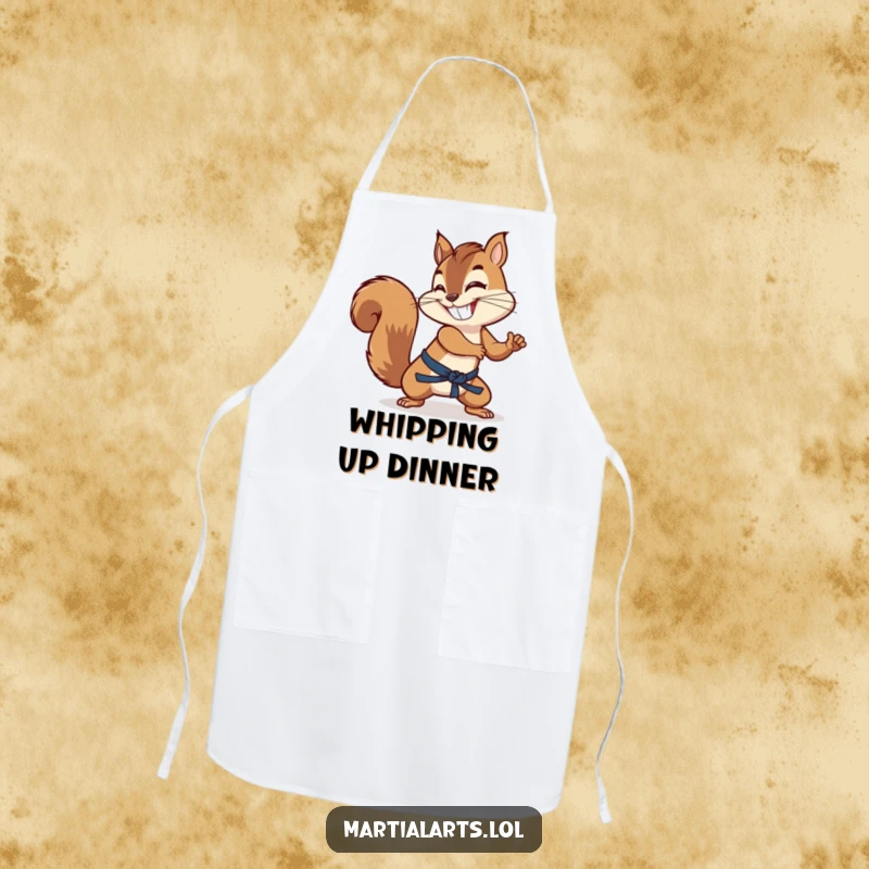 Funny grinning squirrel using its tail as a martial arts weapon, featured on a durable chef's apron.
