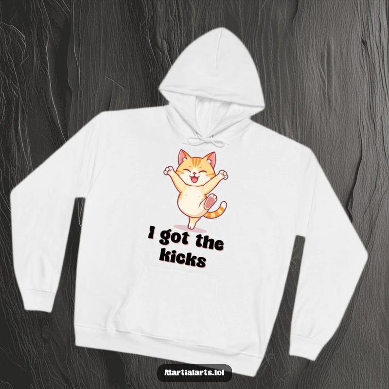 Funny cat hoodie depicting a happy cat executing a dynamic high kick with a determined expression, offering warmth and humor.