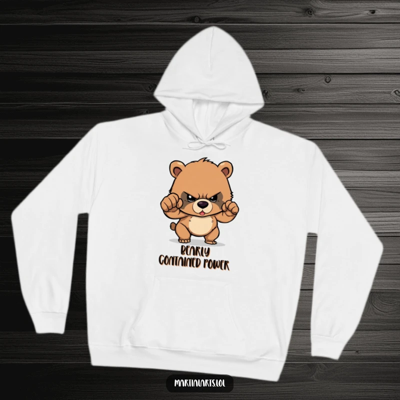 Funny Hoodie: A small, determined bear cub is depicted with intense focus, ready to land a powerful punch.