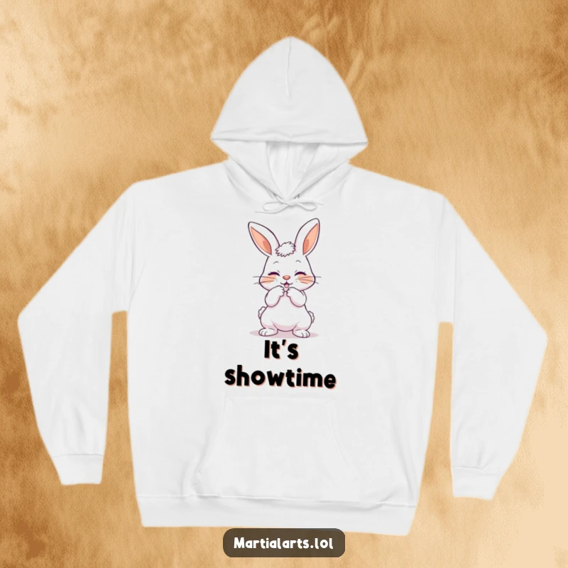 Funny cozy hoodie featuring a playful bunny bowing with a mock strike, blending humor and comfort for gifting.