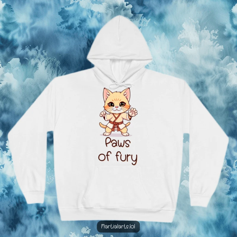 Funny curious kitten in a martial arts pose on a hoodie, cozy apparel for the aspiring feline fighter.