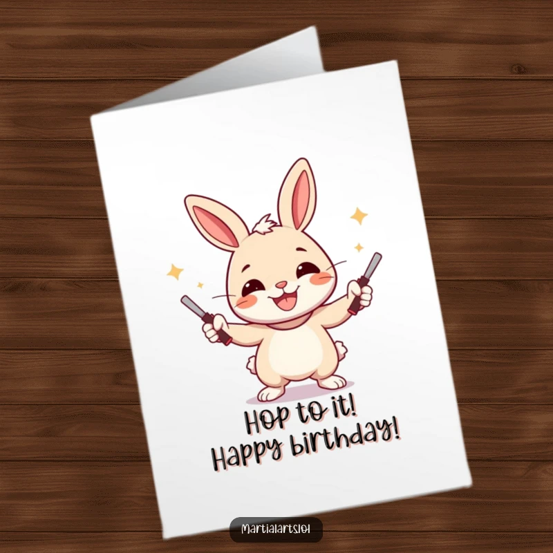 Funny Free Printable Birthday Card: A cheerful rabbit with a wide smile expertly juggling nunchucks.