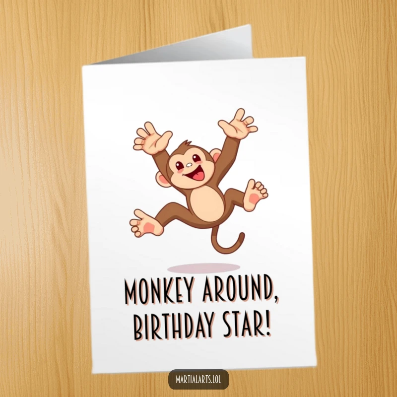 Funny Free Printable Birthday Card: A mischievous monkey attempting a playful, acrobatic flip with a party hat.