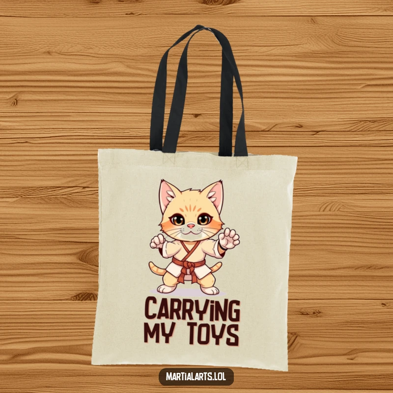Funny curious kitten in a martial arts pose on a tote bag, a stylish and humorous accessory for cat lovers.