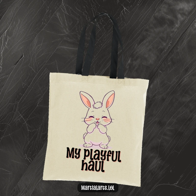 Funny tote bag showcasing a playful bunny bowing with a mock strike, ideal for carrying items with a humorous touch.